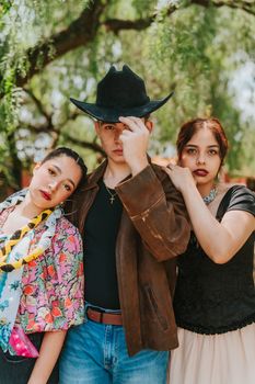 Stylish group posing in vintage fashion outdoors. - Fotografer Sidoarjo