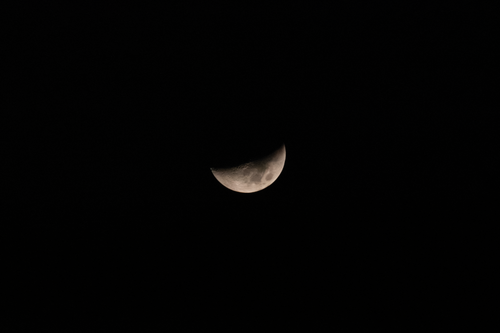 Free A serene crescent moon phases through the night sky over México, offering a celestial glimpse. Stock Photo