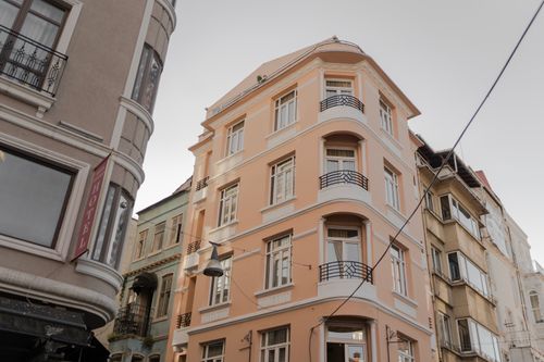 Free A picturesque view of a European architectural style building facade during the day. Stock Photo