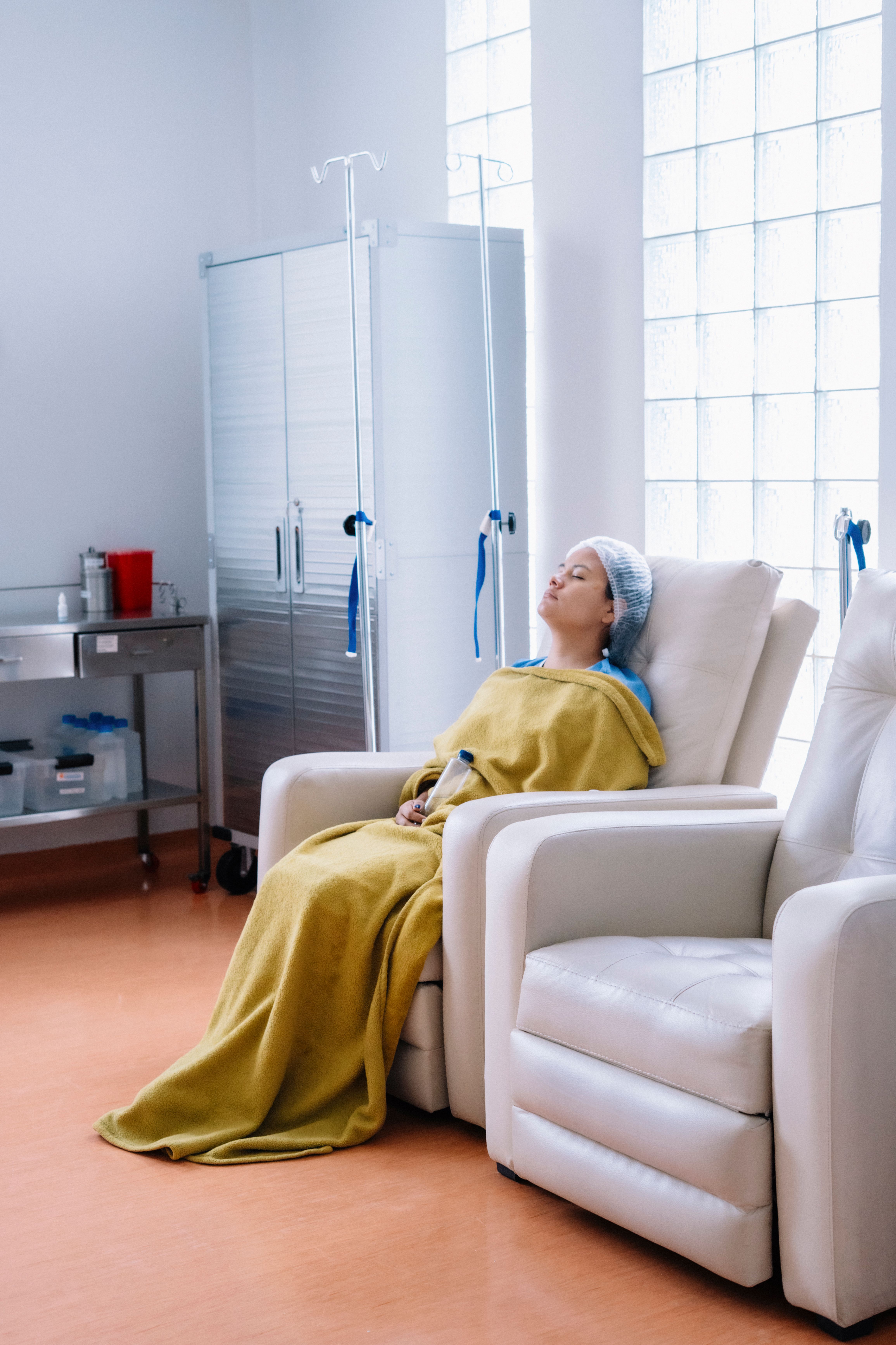 Therapist helping a patient with post-surgical exercises