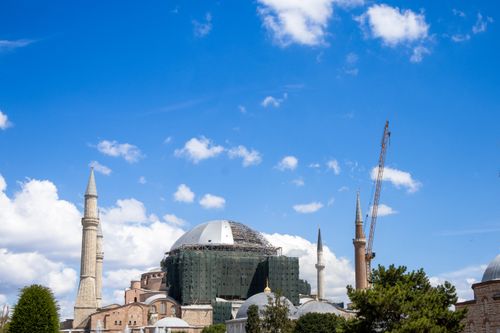 Free A scenic view of Hagia Sophia undergoing restoration, framed by a clear blue sky in Istanbul, Türkiye. Stock Photo