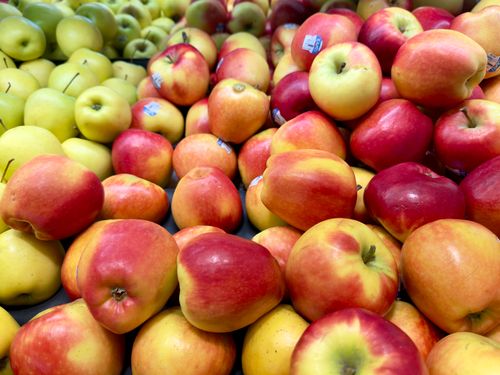 Free An abundant display of fresh red and green apples at a market in Maribyrnong, Victoria. Stock Photo