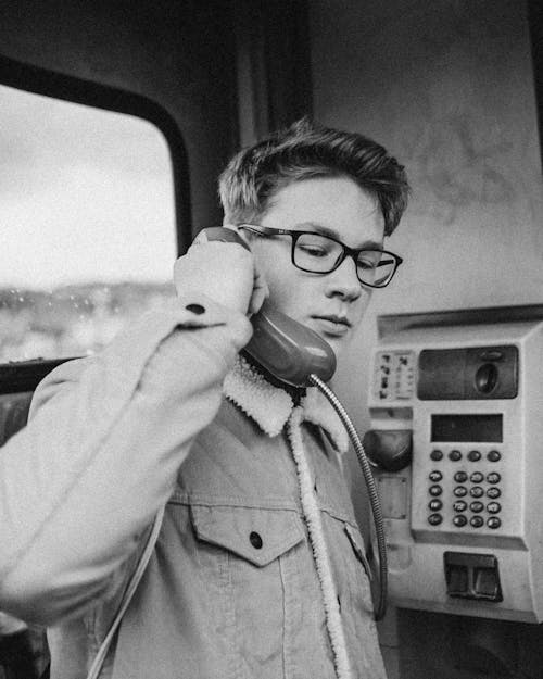 Grayscale Photo Of Man On The Phone