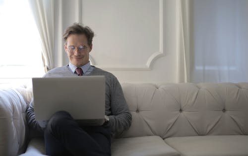 Free Man Using Laptop Stock Photo
