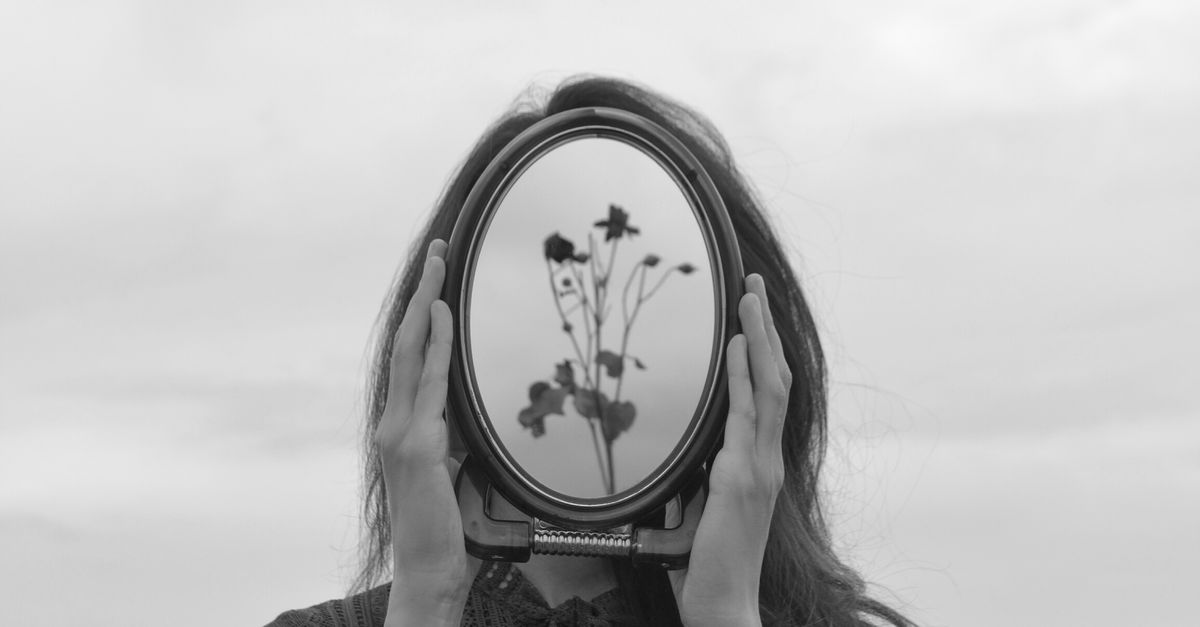 Surreal Portrait With A Mirror And Floral Reflection Free Stock Photo surreal-portrait-with-a-mirror-and-floral-reflection-free-stock-photo