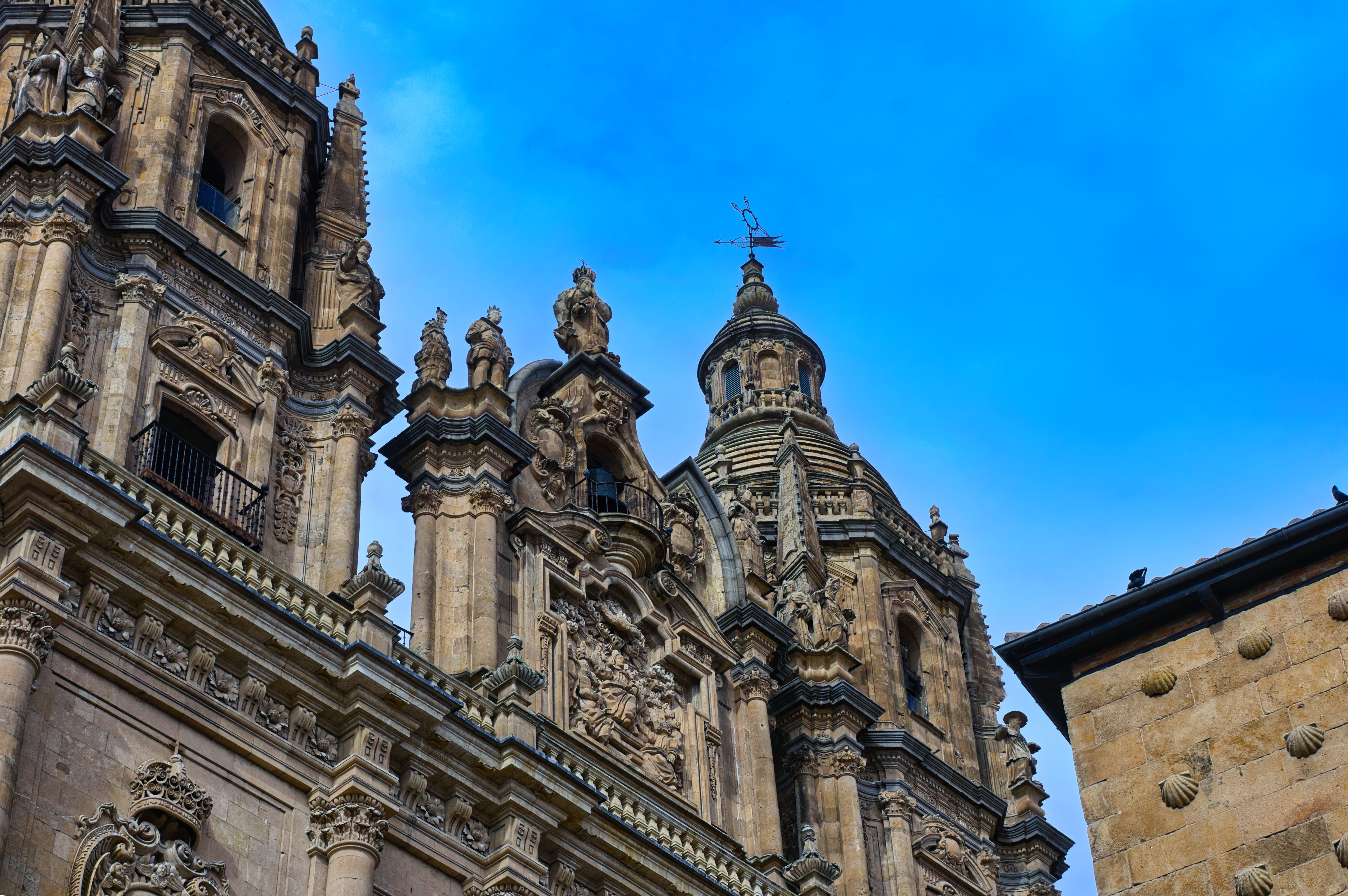 Detailed view of the Baroque architecture at Iglesia de la Clerecía in Salamanca, Spain.