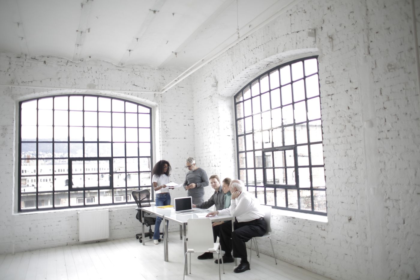 Diverse IT professionals collaborating in a modern office