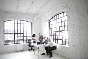 Template preview: colleagues collaborating in an office — photo by Andrea Piacquadio on Pexels