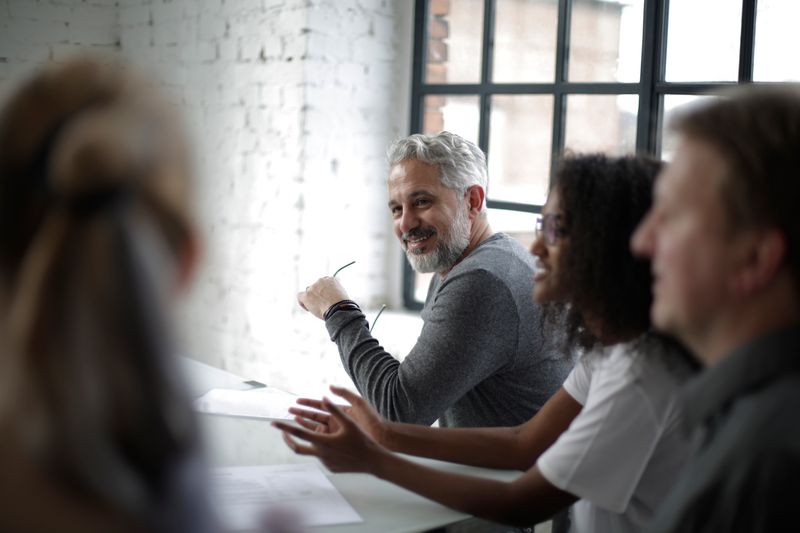 A diverse group of professionals engaging