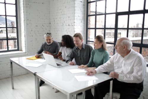 Free Group of People Having A Meeting Stock Photo