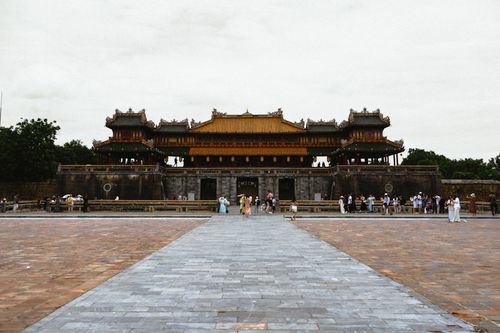 Free Ngọ Môn Gate, the main entrance to the Imperial City of Hue, Vietnam, showcasing traditional Vietnamese architecture and culture. Stock Photo