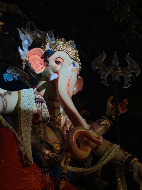 Free Close-up of a colorful Ganesh idol photographed at night, showcasing detailed craftsmanship in Mumbai, India. Stock Photo