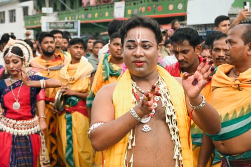 Free Vibrant scene of people in traditional attire participating in a cultural festival, showcasing rich heritage and community spirit. Stock Photo