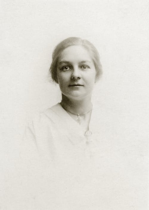 Woman in White Collared Shirt