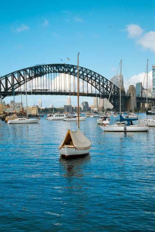 Free Scenic view of boats in Sydney Harbour with the Sydney Harbour Bridge in the background. Stock Photo