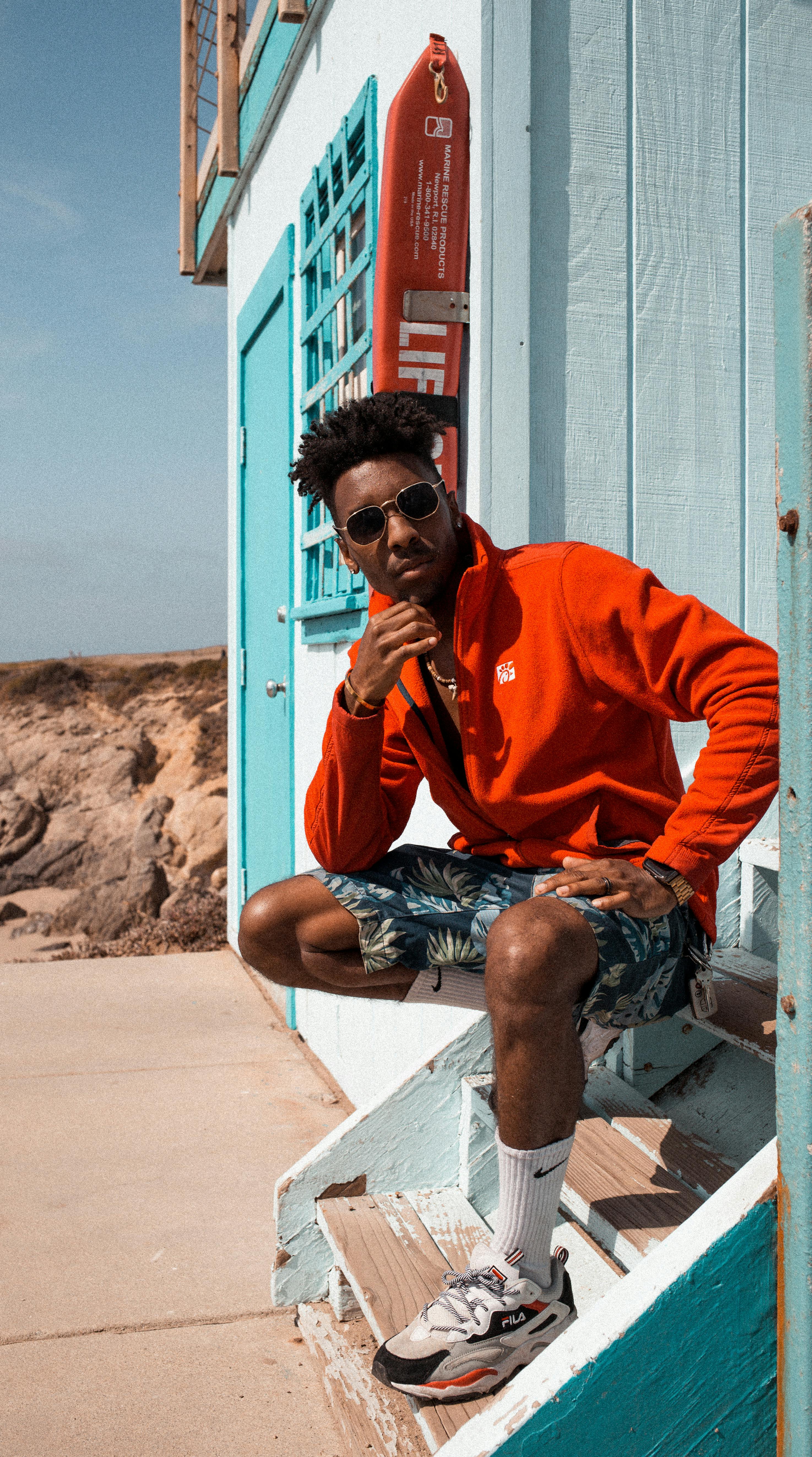 Family working and studying remotely at a kitchen table with laptops and notebooks