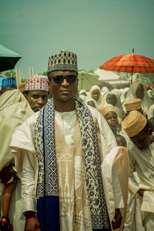 Free A vibrant outdoor gathering showcasing Nigerian traditional attire and culture in Zaria City. Stock Photo