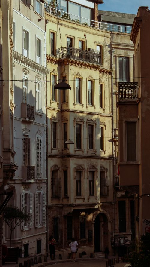 Free Beautiful historic buildings in Istanbul captured in warm, golden sunlight. Stock Photo