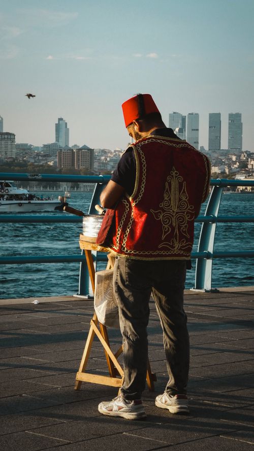 Free A traditional vendor serving ice cream along the Bosphorus in İstanbul, Türkiye. Stock Photo