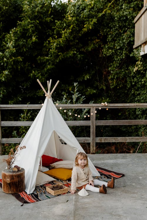 Free Photo Of Toddler Sitting On Floor Stock Photo