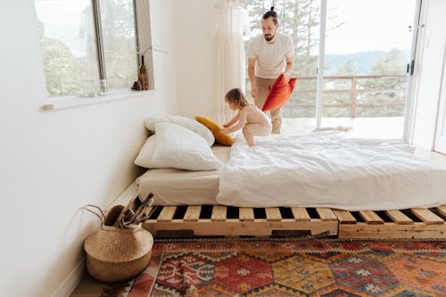 Free Photo Of Man Holding Pillow Stock Photo