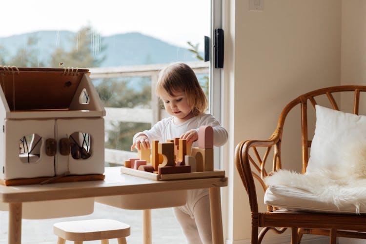 Photo Of Child Playing Wooden Blocks