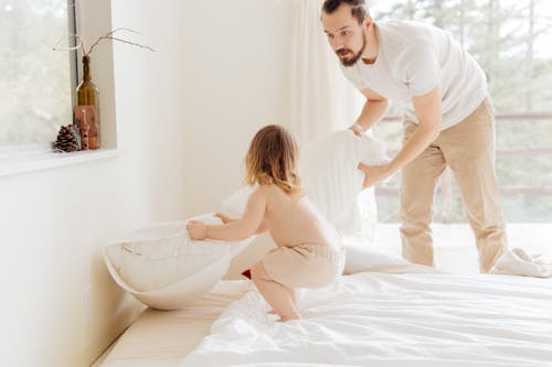 Free Photo Of Man Holding Pillow Stock Photo