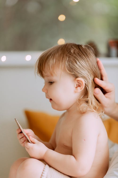 Free Photo Of Person Touching Baby's Hair Stock Photo