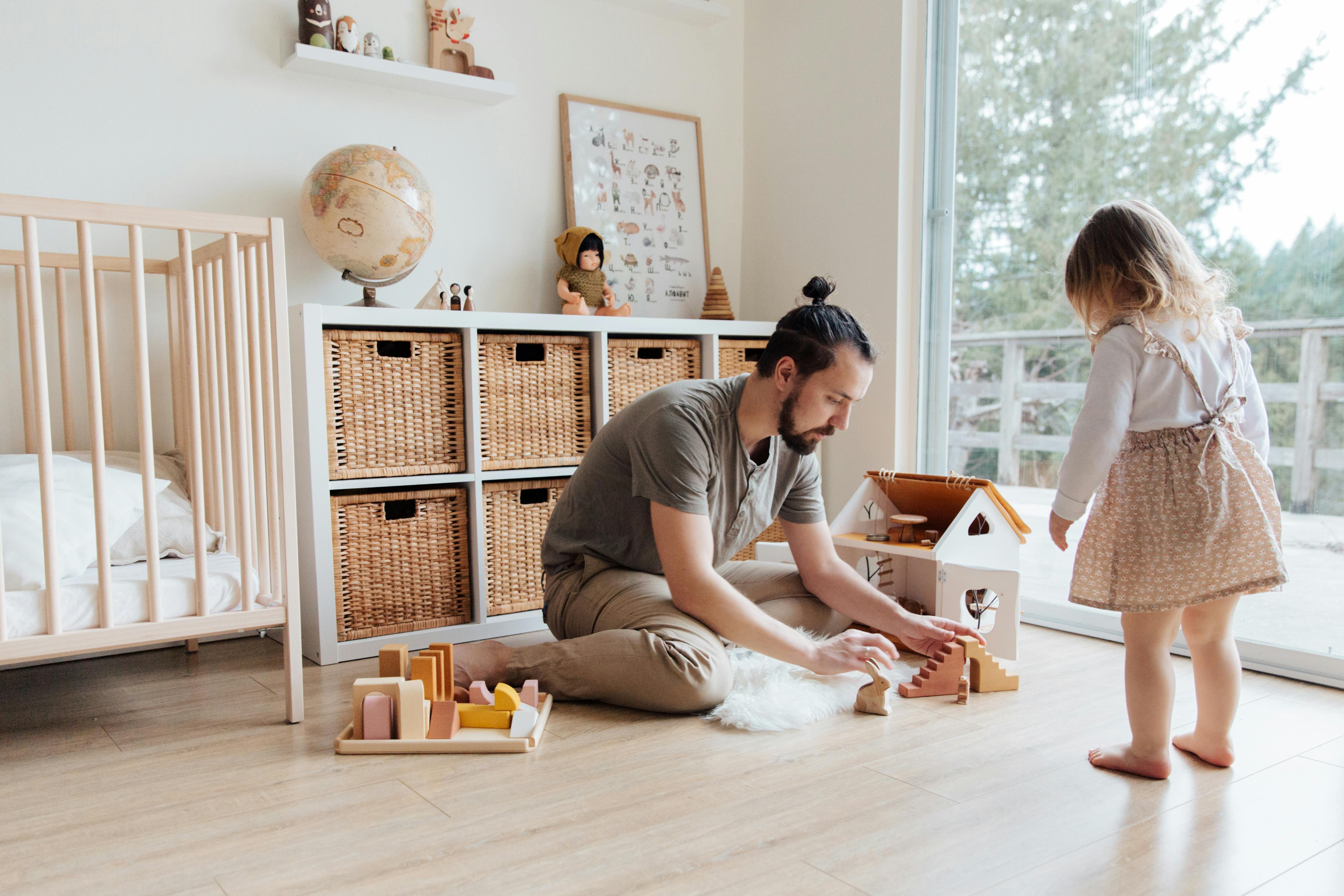 photo of man playing with child