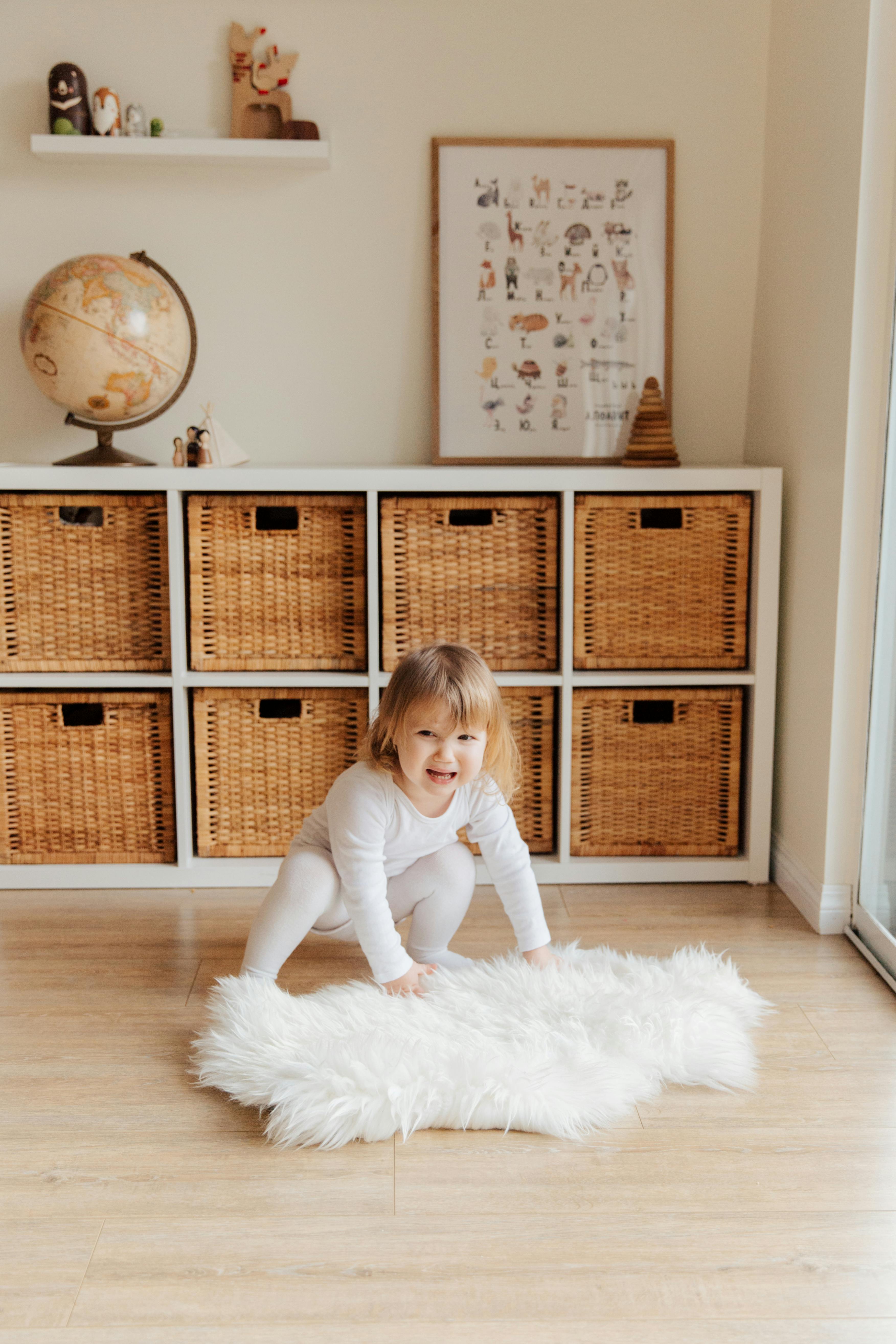 photo of child near wicker baskets