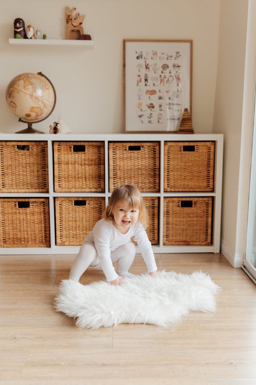 Free Photo Of Child Near Wicker Baskets Stock Photo