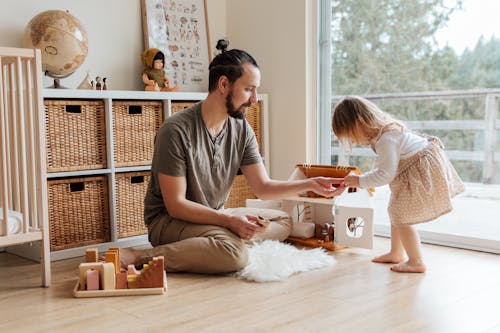 Free Photo Of Man Playing With Daughter Stock Photo