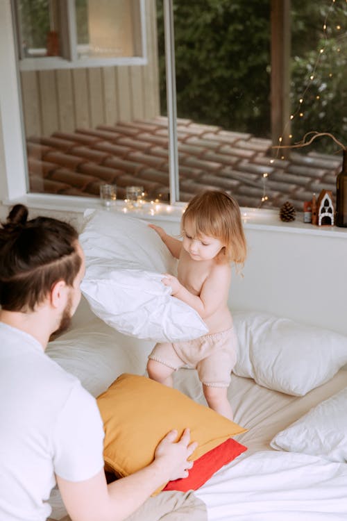 Photo Of Child Holding Pillow