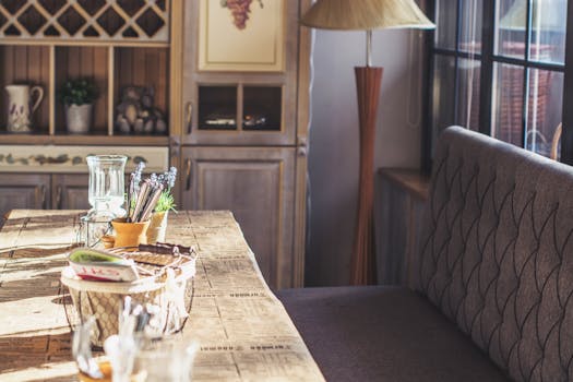 Warm and inviting café interior showcasing rustic wooden furniture and soft natural light.