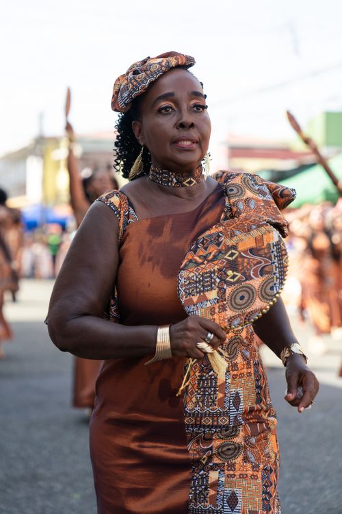 Free A participant in traditional attire at a vibrant parade in Limón, Costa Rica. Stock Photo