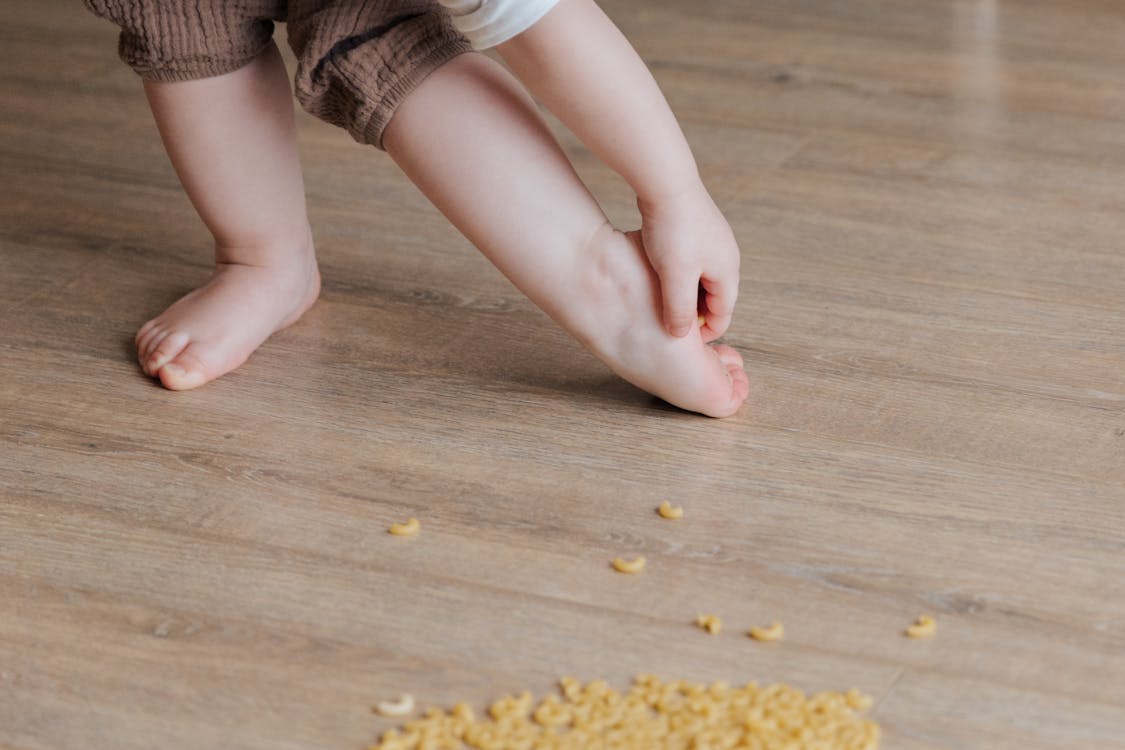 Toddler with parent praying