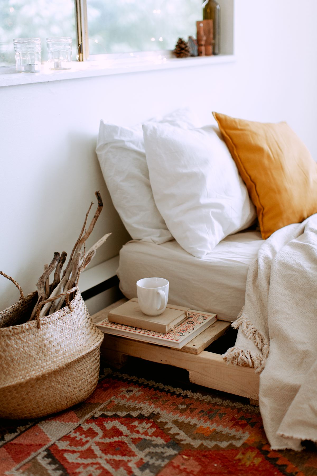 A calm, naturally lit bedroom