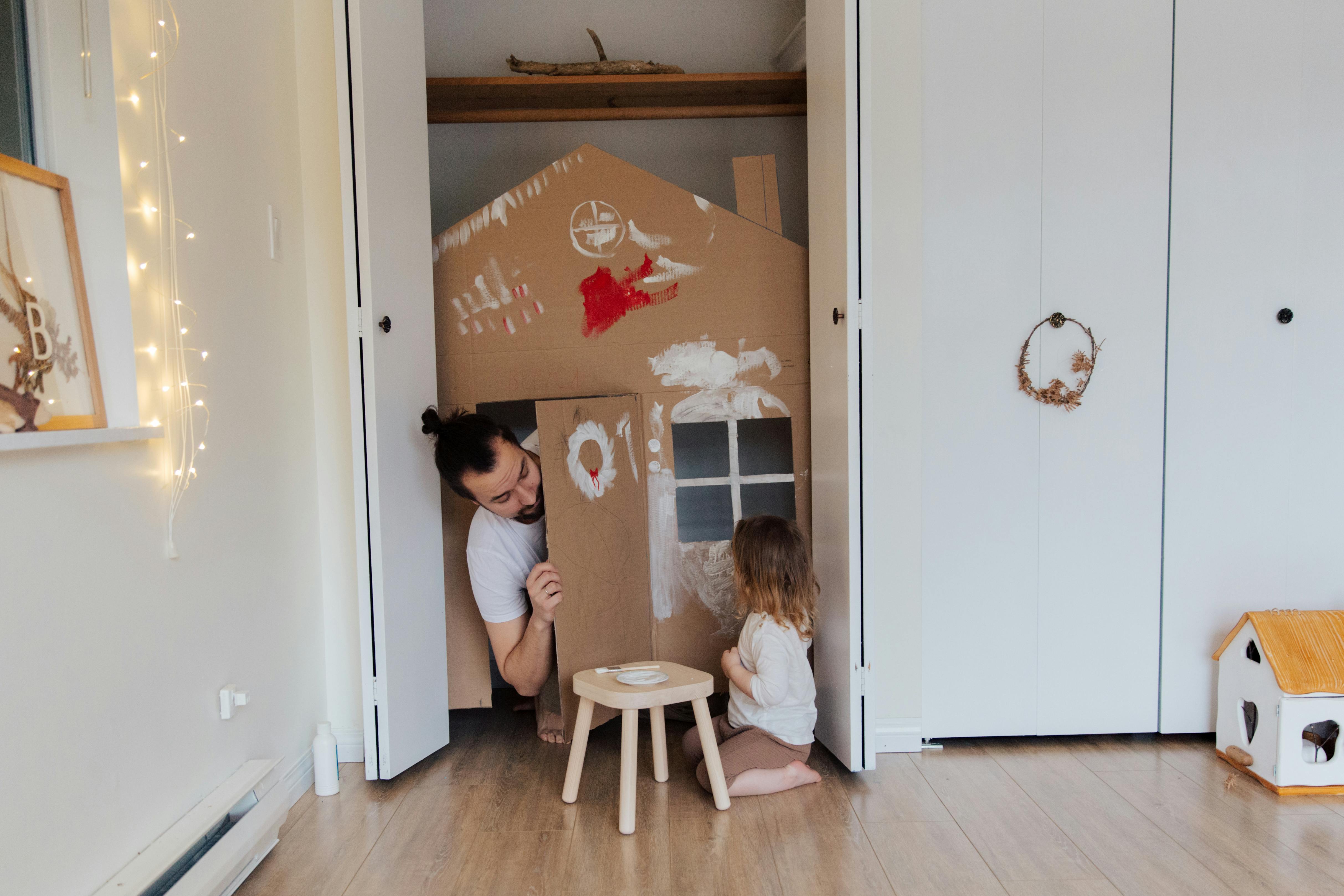 photo of man looking on child