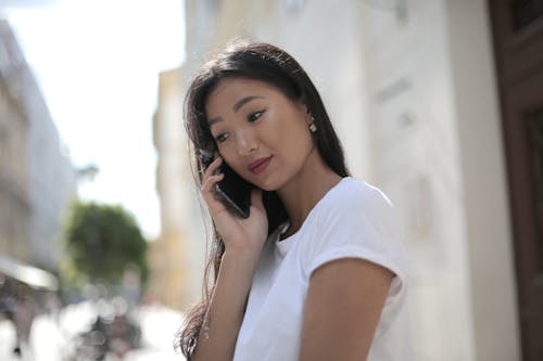 Free Photo Of Woman Wearing White Shirt Stock Photo