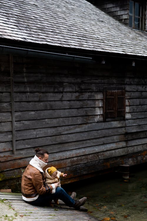 Free Photo Of Man Carrying Baby Stock Photo