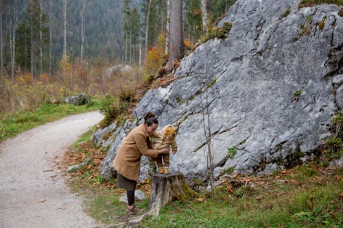 Free Photo Of Kid Standing On Tree Log Stock Photo