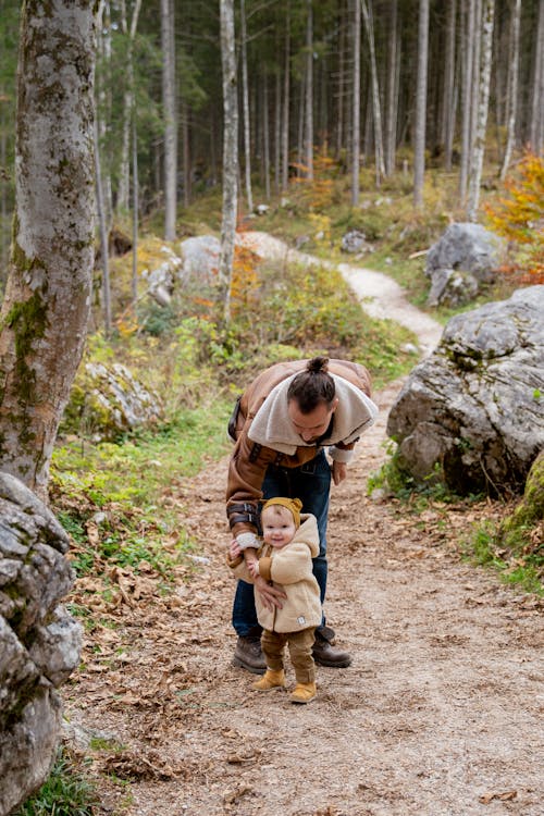 Free Photo Of Man Holding Baby Stock Photo