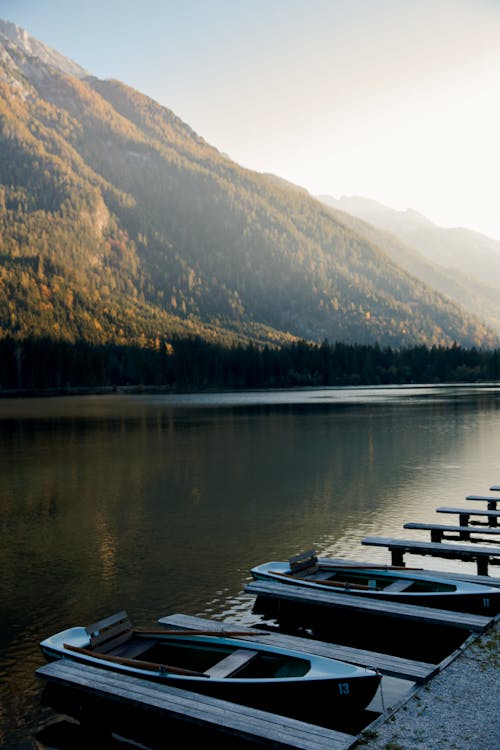 Free Photo Of Boats Beside Lake Stock Photo