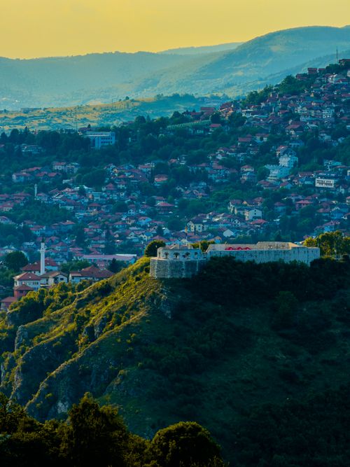 Free A stunning view over Sarajevo with a historical fortress at sunset, showcasing vibrant landscapes. Stock Photo