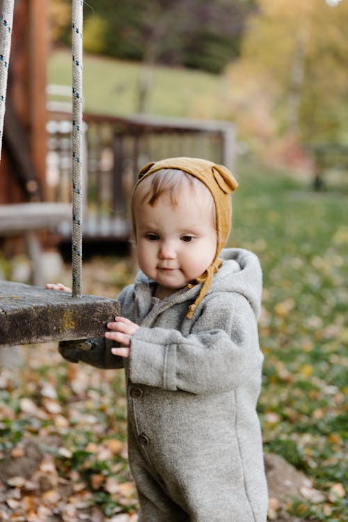 Photo Of Baby Wearing Grey Jacket