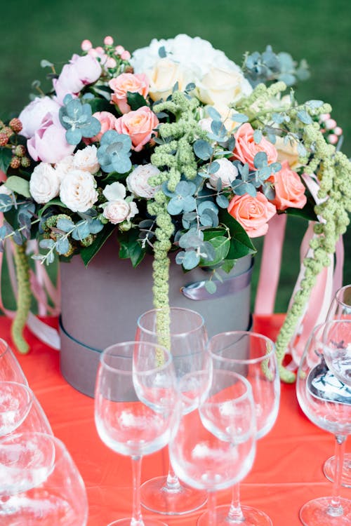 Photo Of Flowers Near Wine Glasses