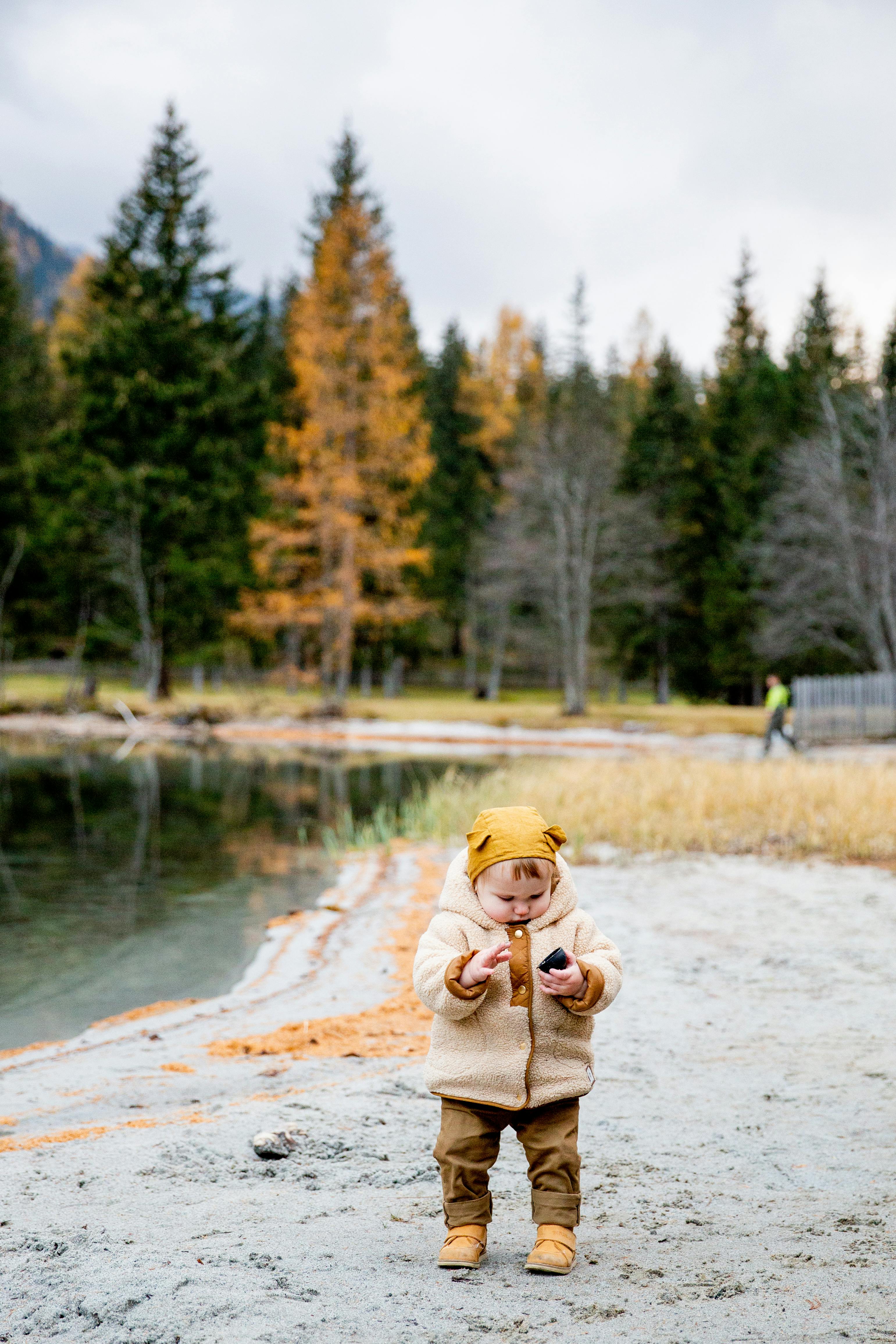 photo of baby wearing jacket