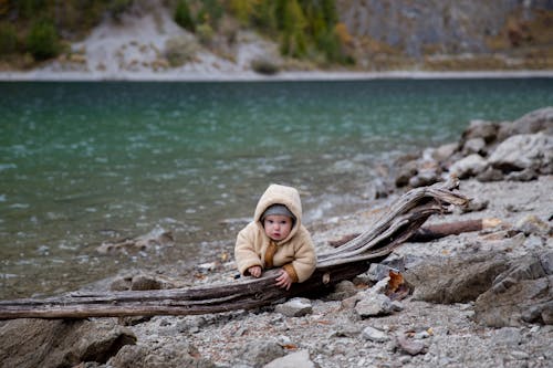 Cute Little Kid Near Body of Water