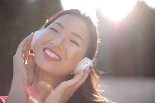 Smiling Woman with Headphones