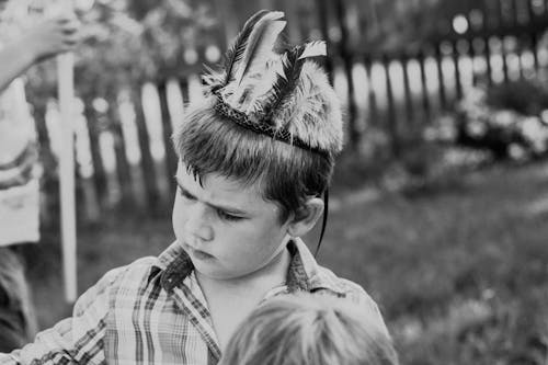 Free stock photo of boy, child, feather